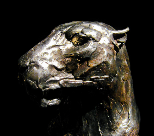 Leopard head sculpture by Dylan Lewis